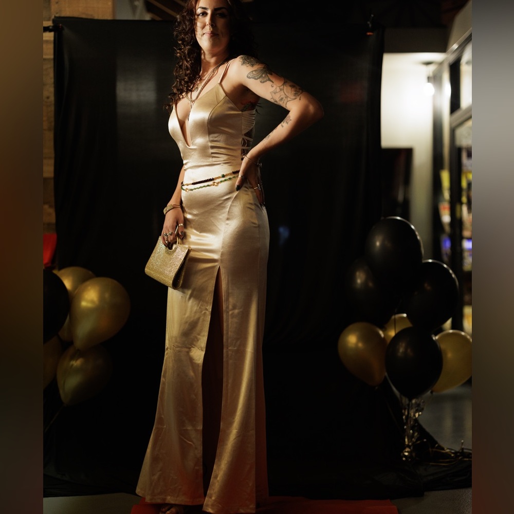 Gold Gown High Slit and Plunging Neck Line